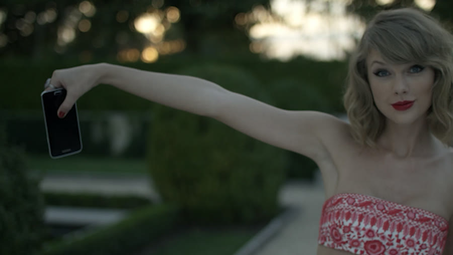 Taylor Swift holding a phone in the Blank Space video — read the story