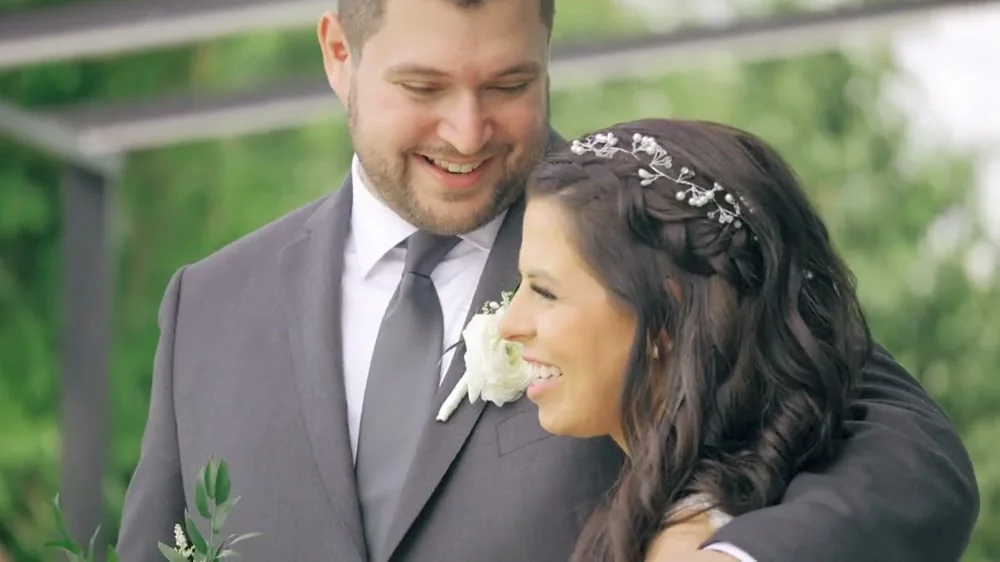 Craig and Nicole together on their wedding day, 2022