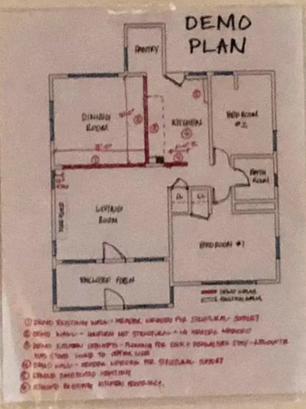 Hand-drawn demolition plan, walls to remove marked in red