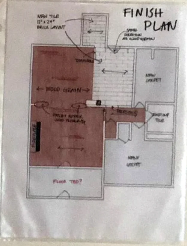 Hand-drawn finish plan showing flooring, tile and wood grain direction